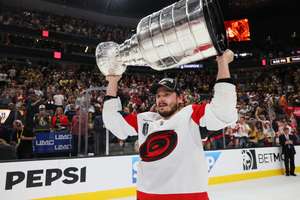 Sebastian Aho lifts the Stanley Cup