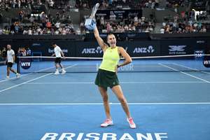 Aryna Sabalenka celebrates Brisbane crown