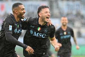 Amir Rrahmani (centre) celebrates scoring for Napoli