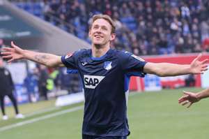 Hoffenheim's Dutch midfielder Wouter Burger celebrates scoring against Bayer Leverkusen