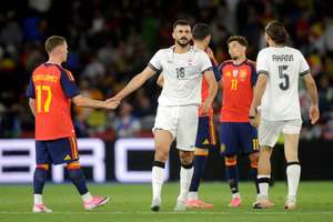 Hussein during a friendly against Spain