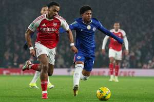 Arsenal defender Jurrien Timber in action with Chelsea's Andrey Santos
