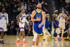 Golden State's Stephen Curry drives to the basket in the Warriors' NBA win over the Utah Jazz