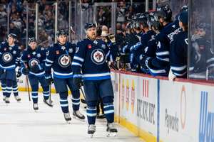 The Winnipeg Jets grabbed a win in the NHL on Tuesday night.