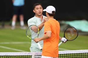 James McCabe (left) shakes hands with Great Britain's Billy Moxon at the Birmingham Open Qualifiers.