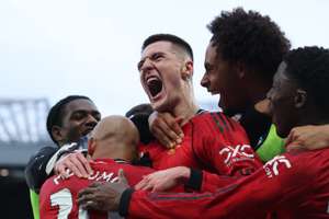 Manchester United's Benjamin Sesko celebrates scoring their third goal with teammates 