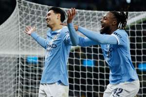 Manchester City's Tijjani Reijnders celebrates scoring their third goal with Antoine Semenyo 