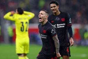 Bayer Leverkusen's Alex Grimaldo celebrates his strike