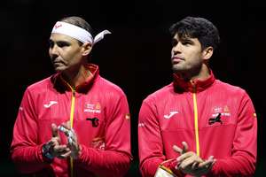 Rafael Nadal (L) is tipping Spanish compatriot Carlos Alcaraz to win the Australian Open