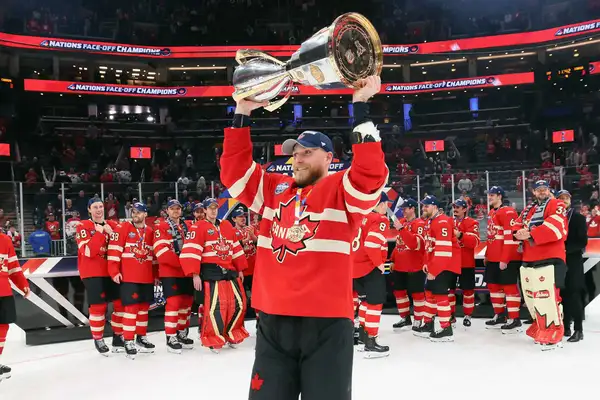 Sam Bennett lifts the 4 Nations Face-Off Championship trophy