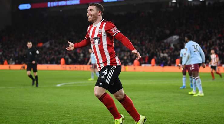 Vào! John Lundstram thể hiện nhãn quan tuyệt vời của mình với đường chuyền sắc sảo cho John Fleck (Sheffield Utd), người đã rất bình tĩnh sút bóng gọn gàng vào sát mé trong cột dọc bên phải. Tỉ số là 1:0.