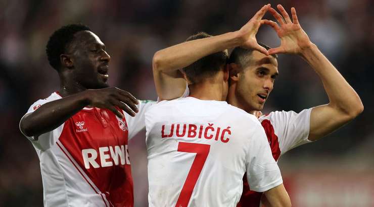 Tỉ số là 3:2! Linton Maina chuyền bóng cho Ellyes Skhiri (Köln) trong vòng cấm, người không bị ai kèm và sút bóng vào góc trái phía dưới.