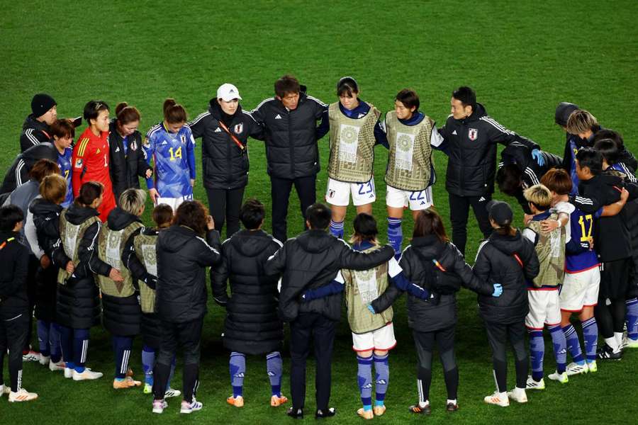 Japan's players and staff after World Cup exit