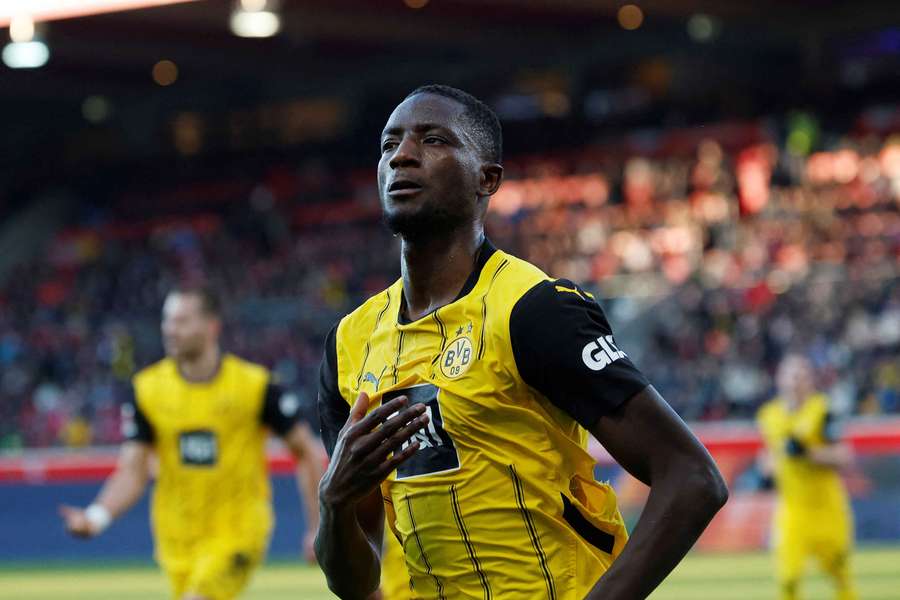 Serhou Guirassy celebrates a goal for Dortmund