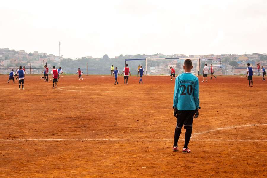 Boys playing on the ground on the outskirts of São Paulo