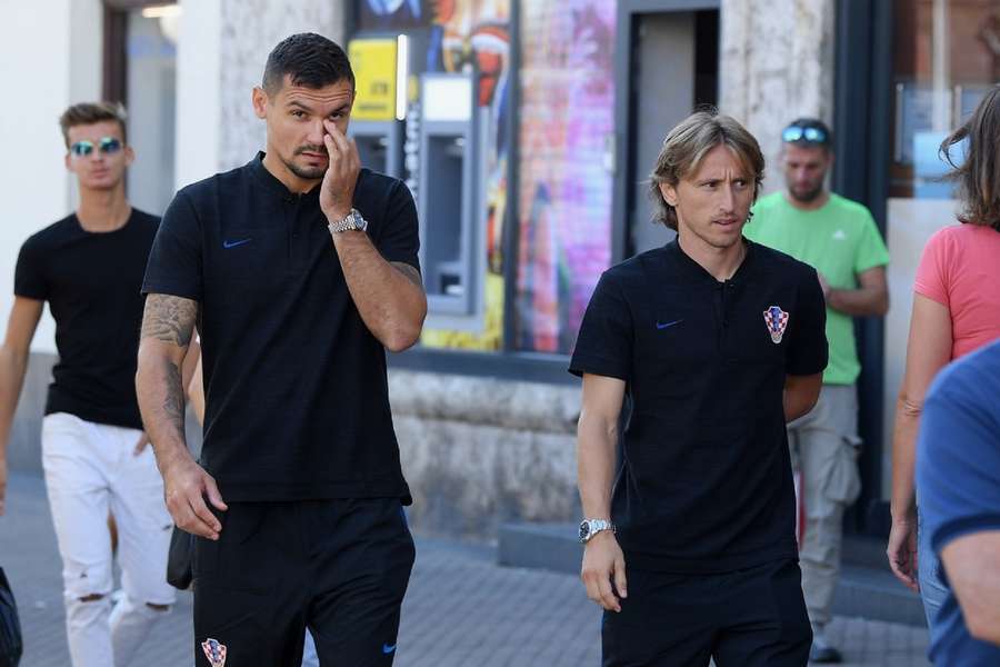 Dejan Lovren (t.v.) og Luka Modric skal for retten igen i deres hjemland.