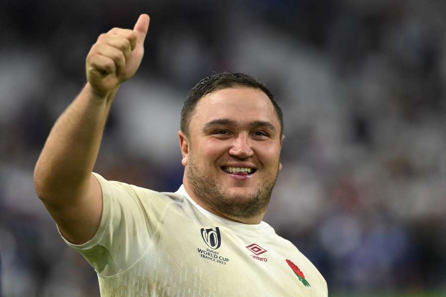 Jamie George celebrates his team's victory at the end of the France 2023 Rugby World Cup quarter-final match between England and Fiji
