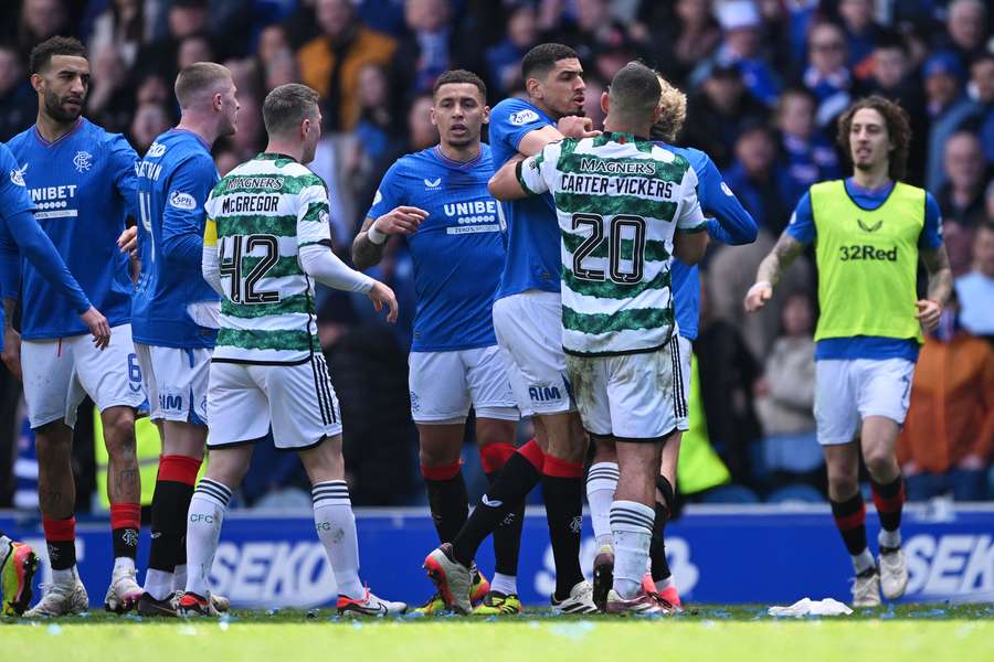 Leon Balogun of Rangers clashes with Cameron Carter-Vickers of Celtic