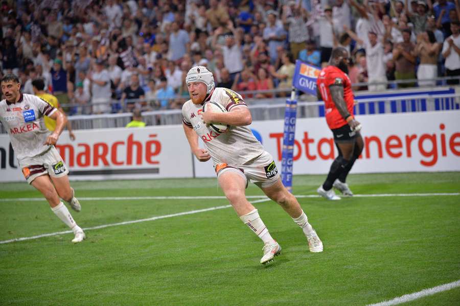 Lamothe goes over for one of his three tries against Toulon