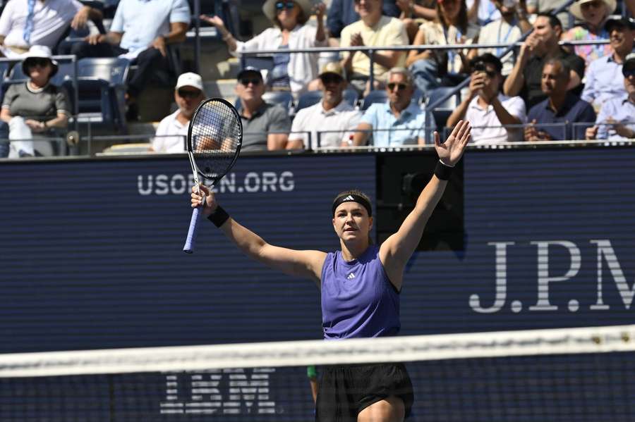 Muchova celebrates her win