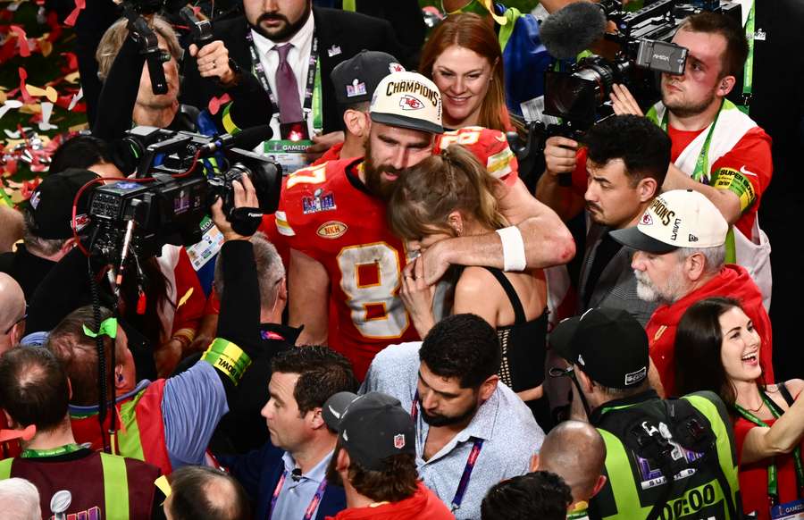 Travis Kelce and Taylor Swift celebrate after the Chiefs' Super Bowl win