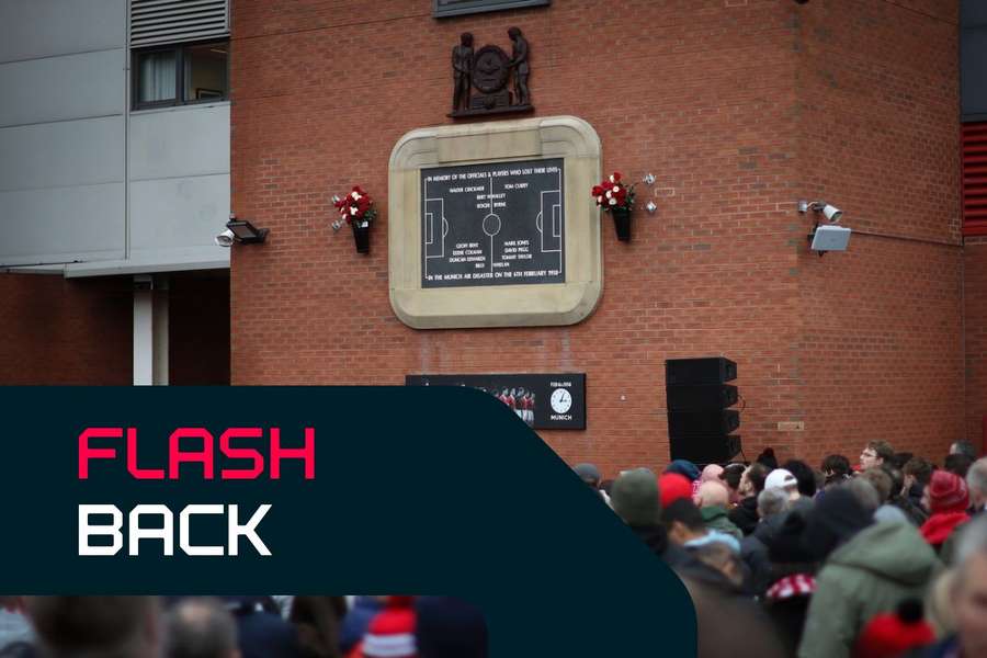 Fans gather around the memorial to the Munich air disaster at Old Trafford