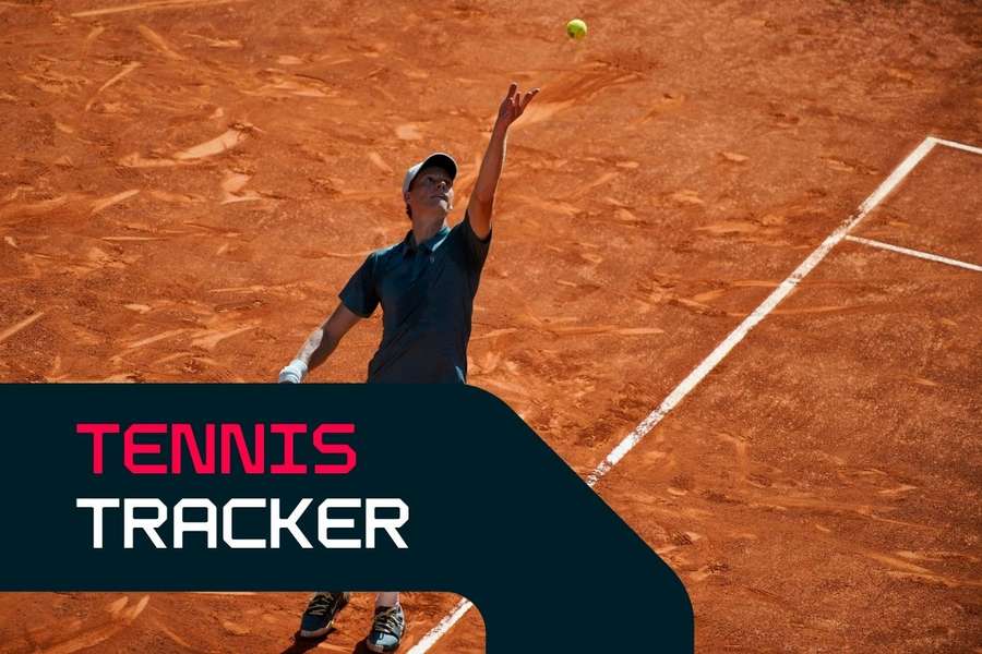 Jannik Sinner serves