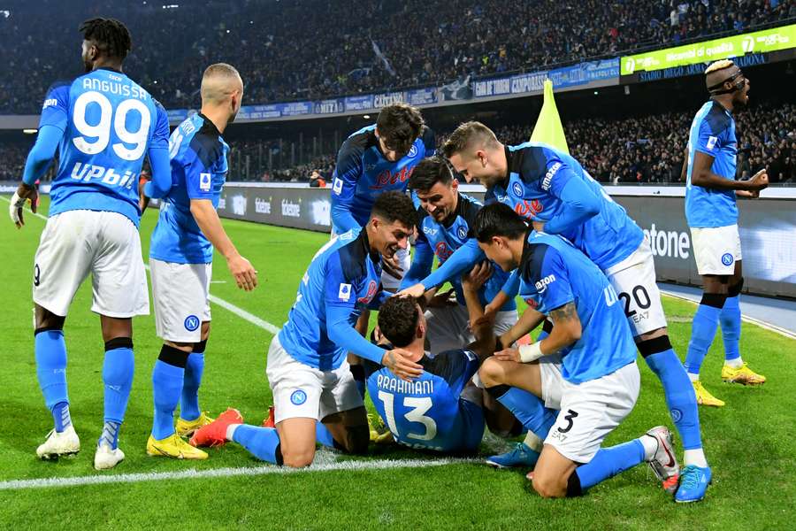 Amir Rrahmani celebrates with team mates after scoring a goal during the Italian Serie A football match between Napoli and Juventus 