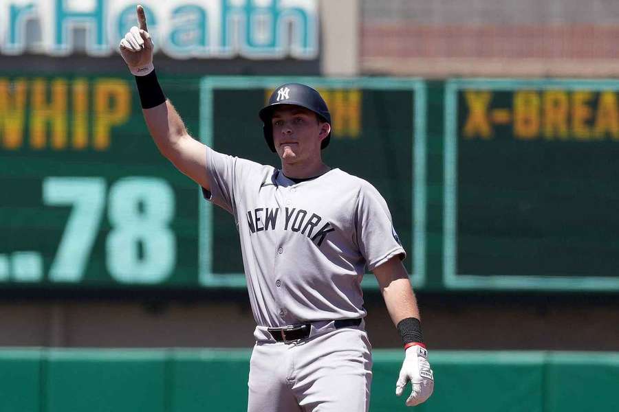 Yankees Ben Rice celebrates during 13-run third inning against the Athletics