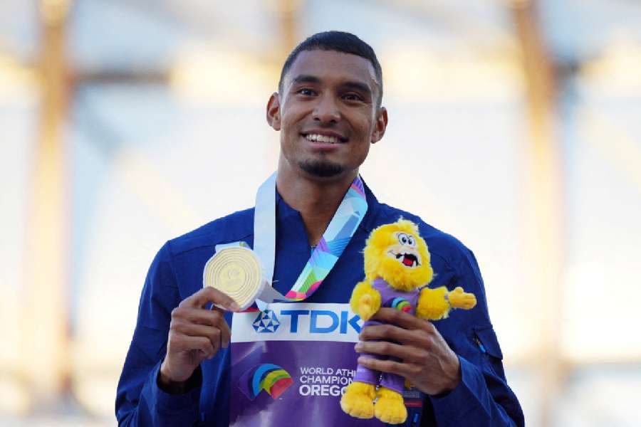 Norman celebrates after winning the men's 400 metres final in Eugene