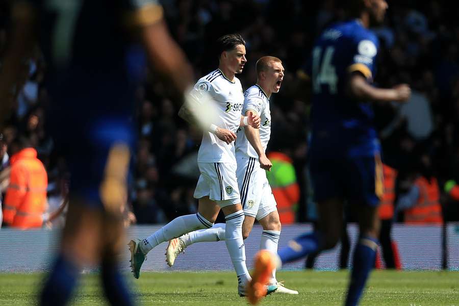 Leeds defender Rasmus Kristensen (back) celebrates