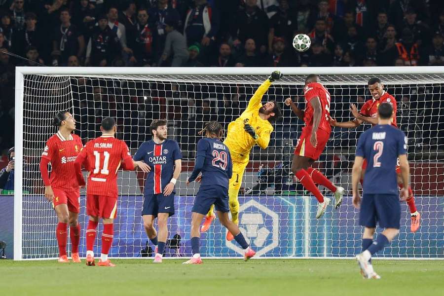 Liverpool's Alisson Becker makes another save during their Champions League match against PSG