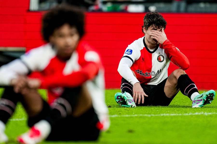 Feyenoord's Hugo Bueno (R) and Calvin Stengs look defeated after their home loss to FC Utrecht