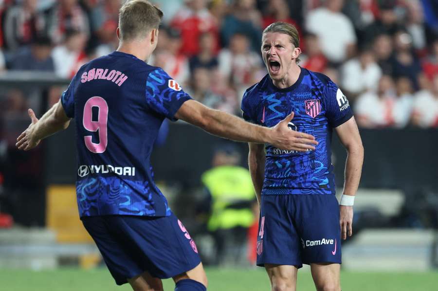 Gallagher celebrates his equalising goal for Atletico 