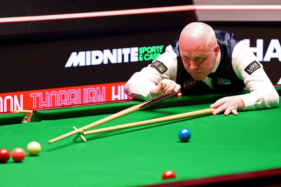 Higgins is a four-time world snooker champion Higgins is a four-time world snooker champion