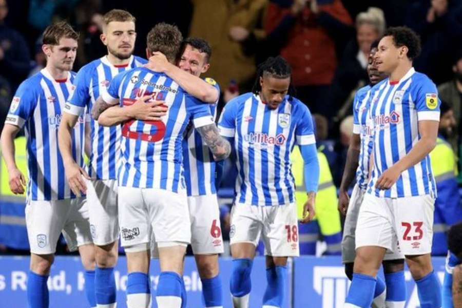Huddersfield celebrate their crucial match-winning goal