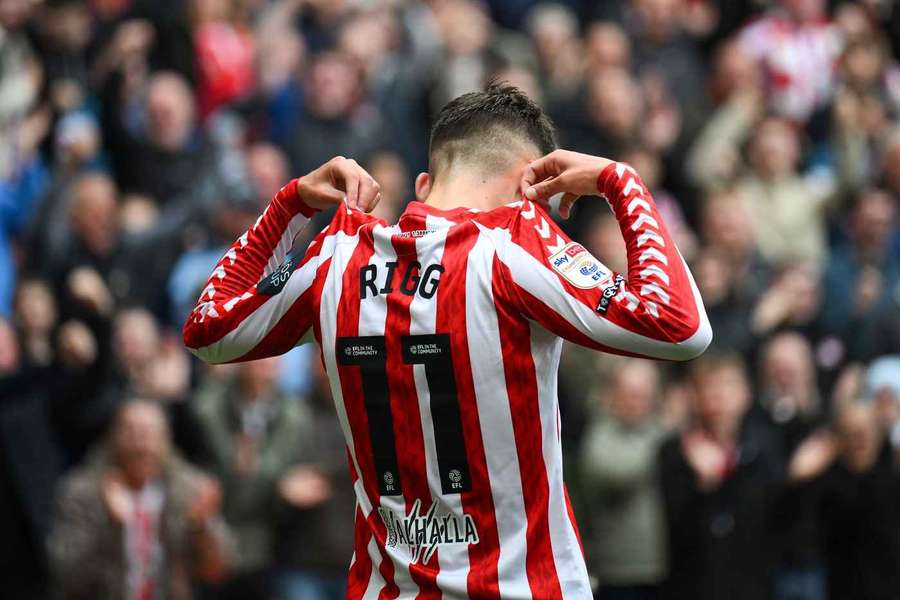 Rigg celebrates his first goal of the season