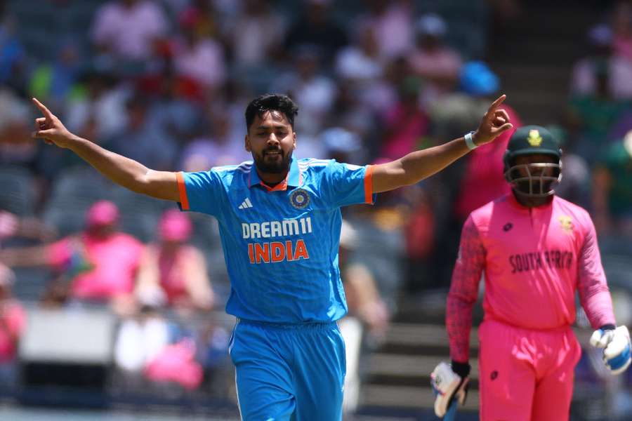 December 17, 2023 India's Avesh Khan celebrates after taking the wicket of South Africa's David Miller