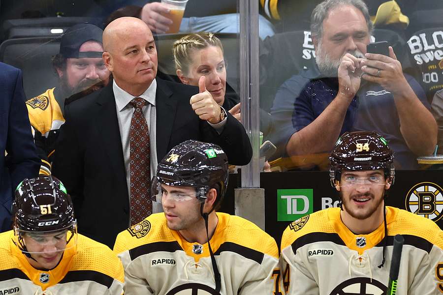 Jim Montgomery gives thumbs up of approval after being hired by the St. Louis Blues as their new head coach.