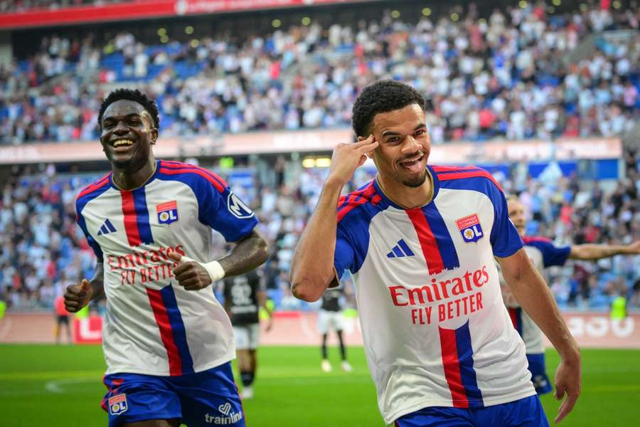 Lyon's Zachary Athekame celebrates scoring