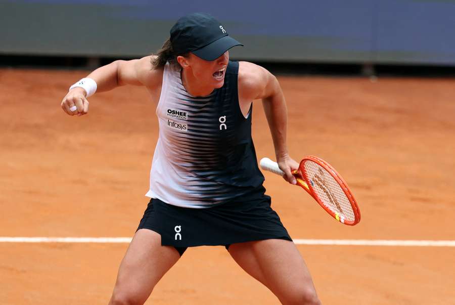 Iga Swiatek celebrates after winning her quarter final match against Jessica Pegula