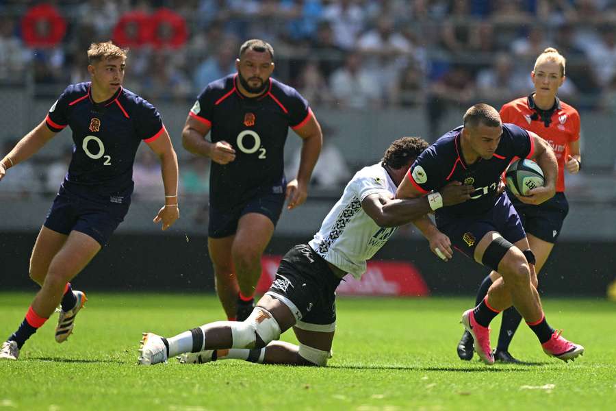 Ben Earl is tackled in England's comprehensive win over Fiji Ben Earl is tackled in England's comprehensive win over Fiji
