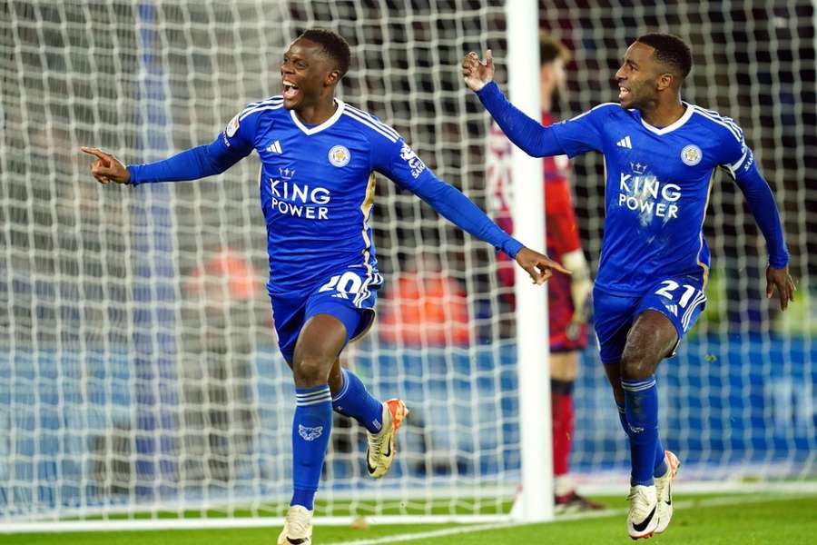 Patson Daka (left) celebrates scoring Leicester's second goal against Millwall with team-mate Ricardo Pereira 