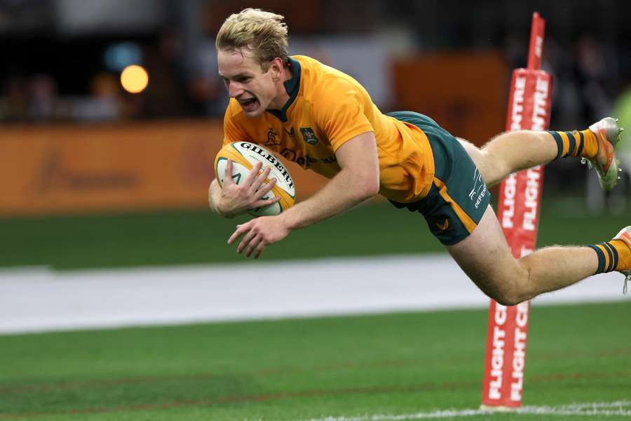 Australia's Max Jorgensen diving over the try line against South Africa on Sunday. Australia's Max Jorgensen diving over the try line against South Africa on Sunday.