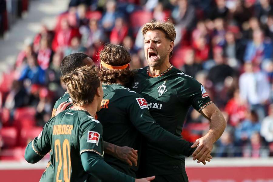 Niclas Fullkrug celebrates after scoring against Mainz 05 in the Bundesliga Niclas Fullkrug celebrates after scoring against Mainz 05 in the Bundesliga