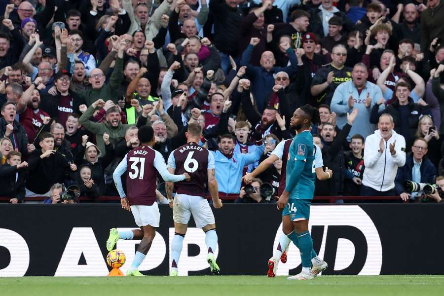 Aston Villa's Ross Barkley celebrates scoring their first goal with Leon Bailey 