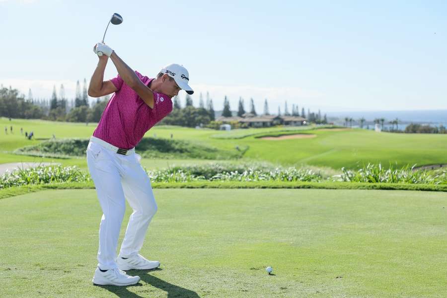 Morikawa plays off the 12th tee at Kapalua