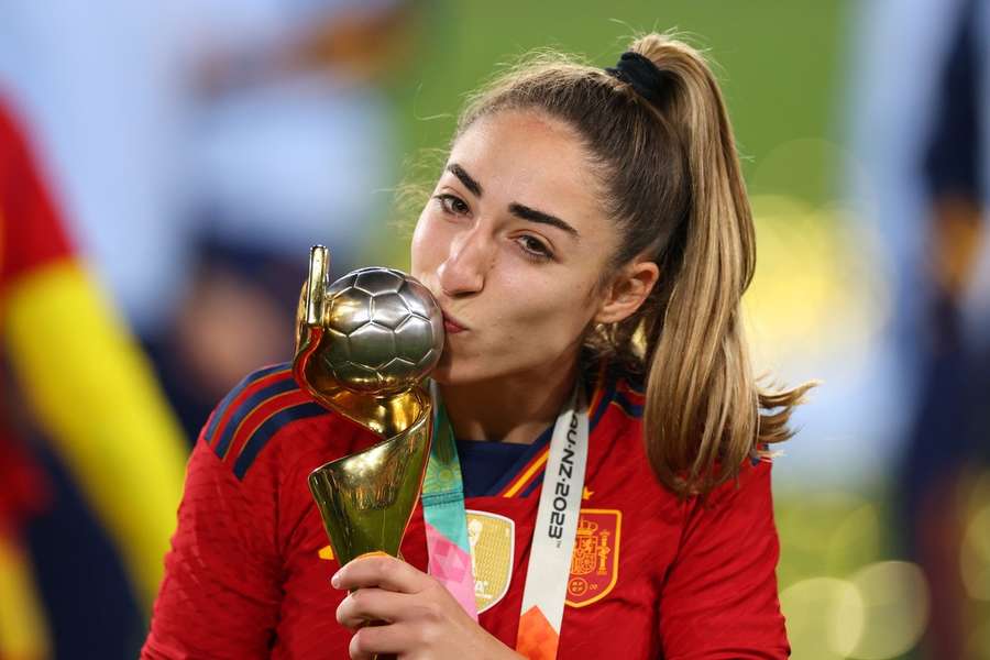 Olga Carmona of Spain celebrates with the World Cup trophy
