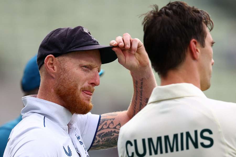 Stokes speaks with Cummins after the match