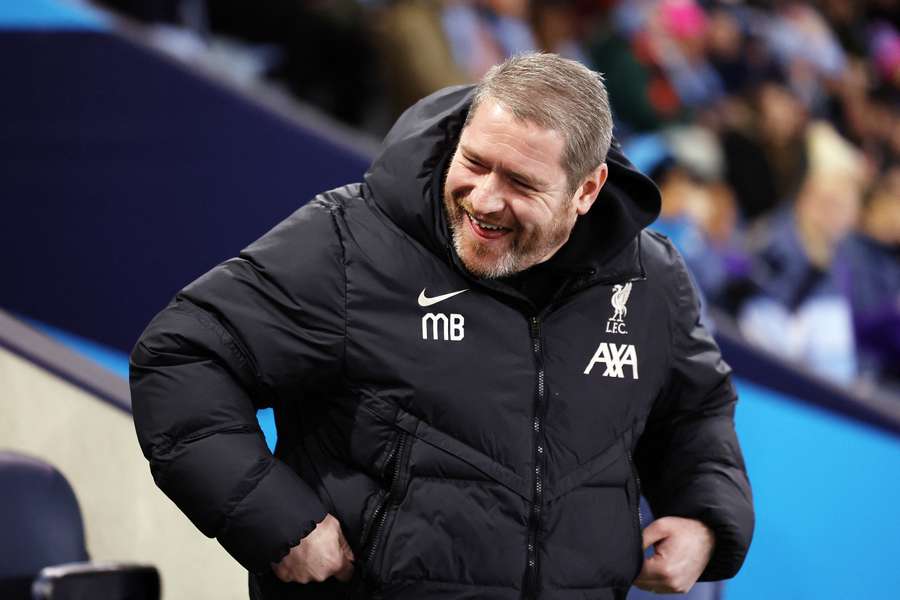 Matt Beard, former manager of Liverpool, looks on